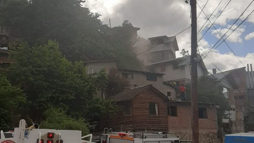 Tres bomberos y dos vecinos al hospital durante un incendio