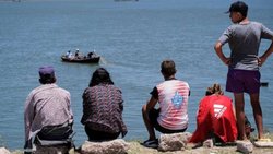 Lo perseguía la Policía, se tiró al río y desapareció