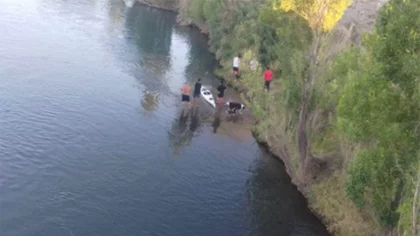 Buscan con buzos a la niña que se llevó el río Limay
